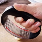 Amassador De Alho 11 X 7cm Ergonômico Em Aço Inox E Plástico