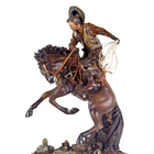 Escultura Cowboy Domando O Cavalo Oldway