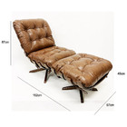 Kit Poltrona + Puff Costela Cor Whisky Base Giratória Madeira