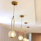 Lustre Pendente Iluminação Arco Dourado com Globo Âmbar Inova
