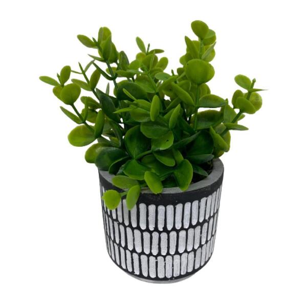 Vaso De Cimento Branco E Preto Com Planta Artificial