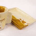 Xícara Com Pires Da Serra Da Capivara. Cor:bege